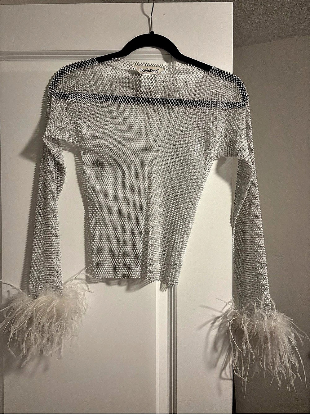 Davi & Dani Feather Cuff Long Sleeve Top in White